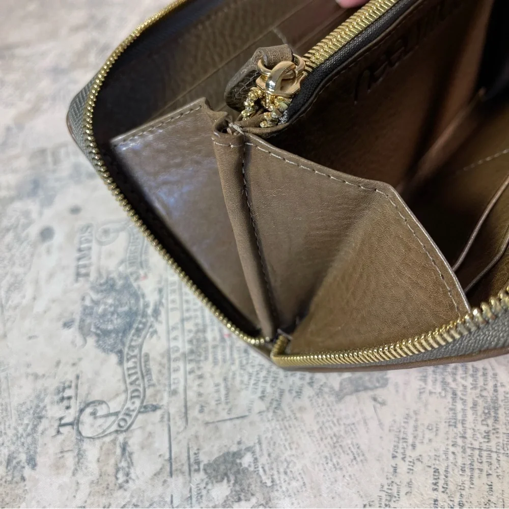 Neely Mack San Francisco zipper around brown leather wallet